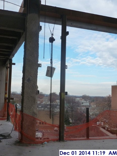 Installed a steel post at the 4th floor North Elevation